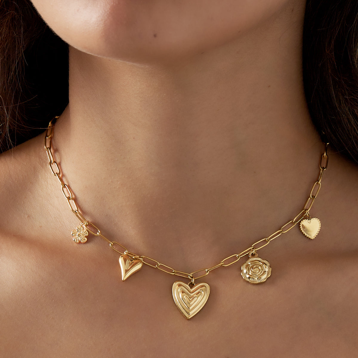 Ketting met bedels met hartjes en bloemetjes