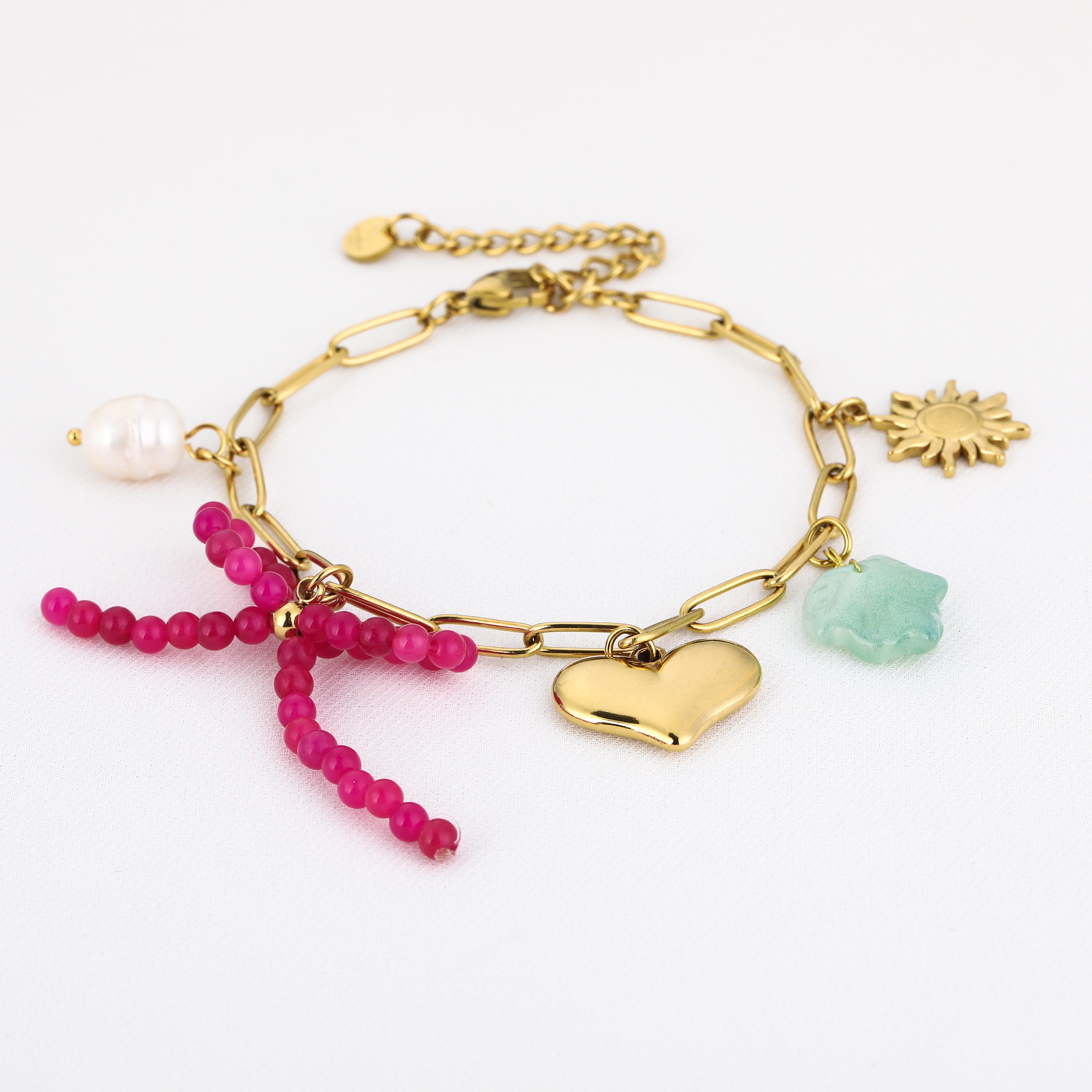 Bedelarmband met roze strik