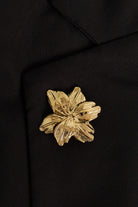 Broche met bloem