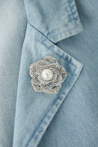 Broche met bloem