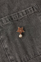 Broche met ster en parel