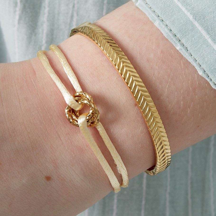 Koord armband ronde bedel
