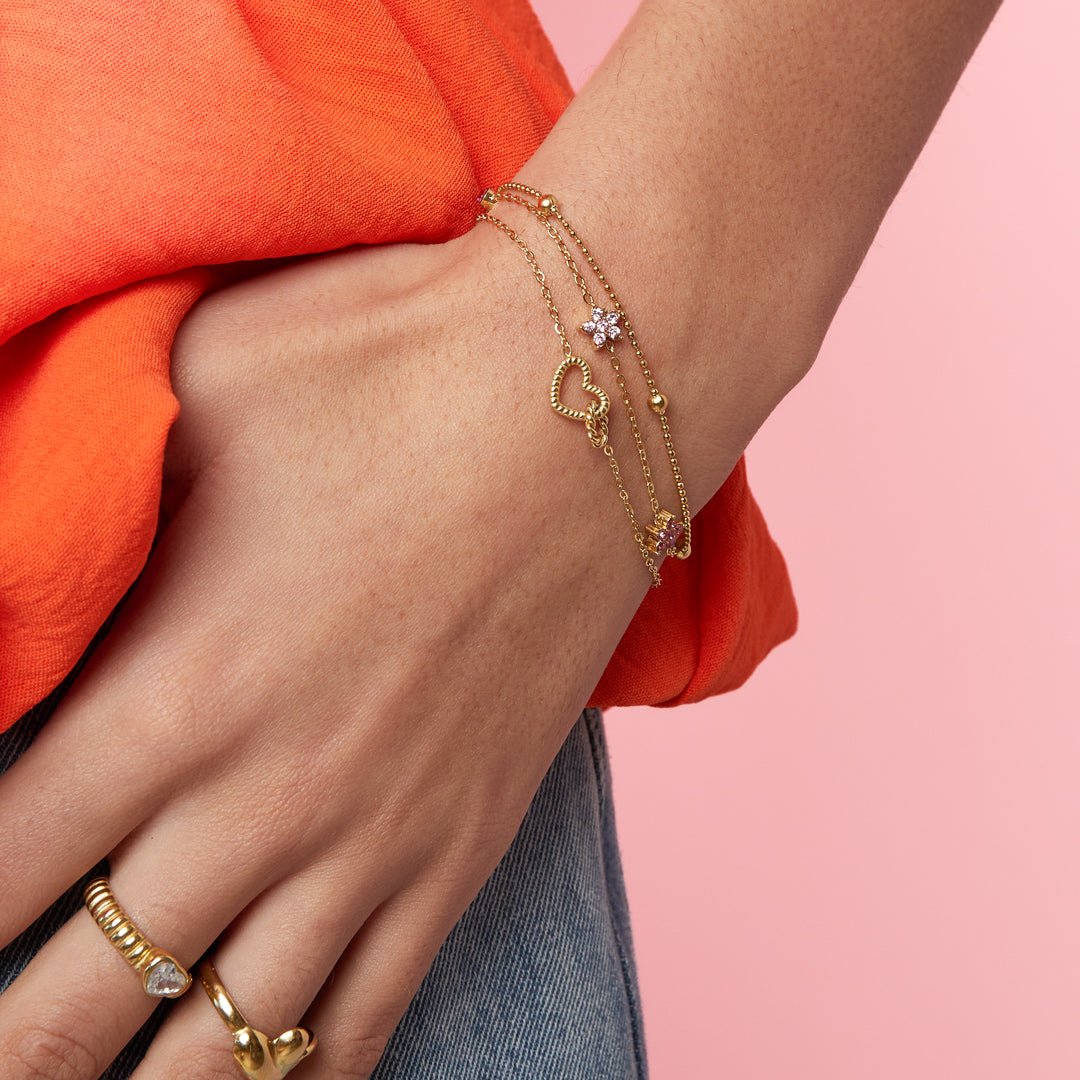 Stainless steel armband met hartje in goud
