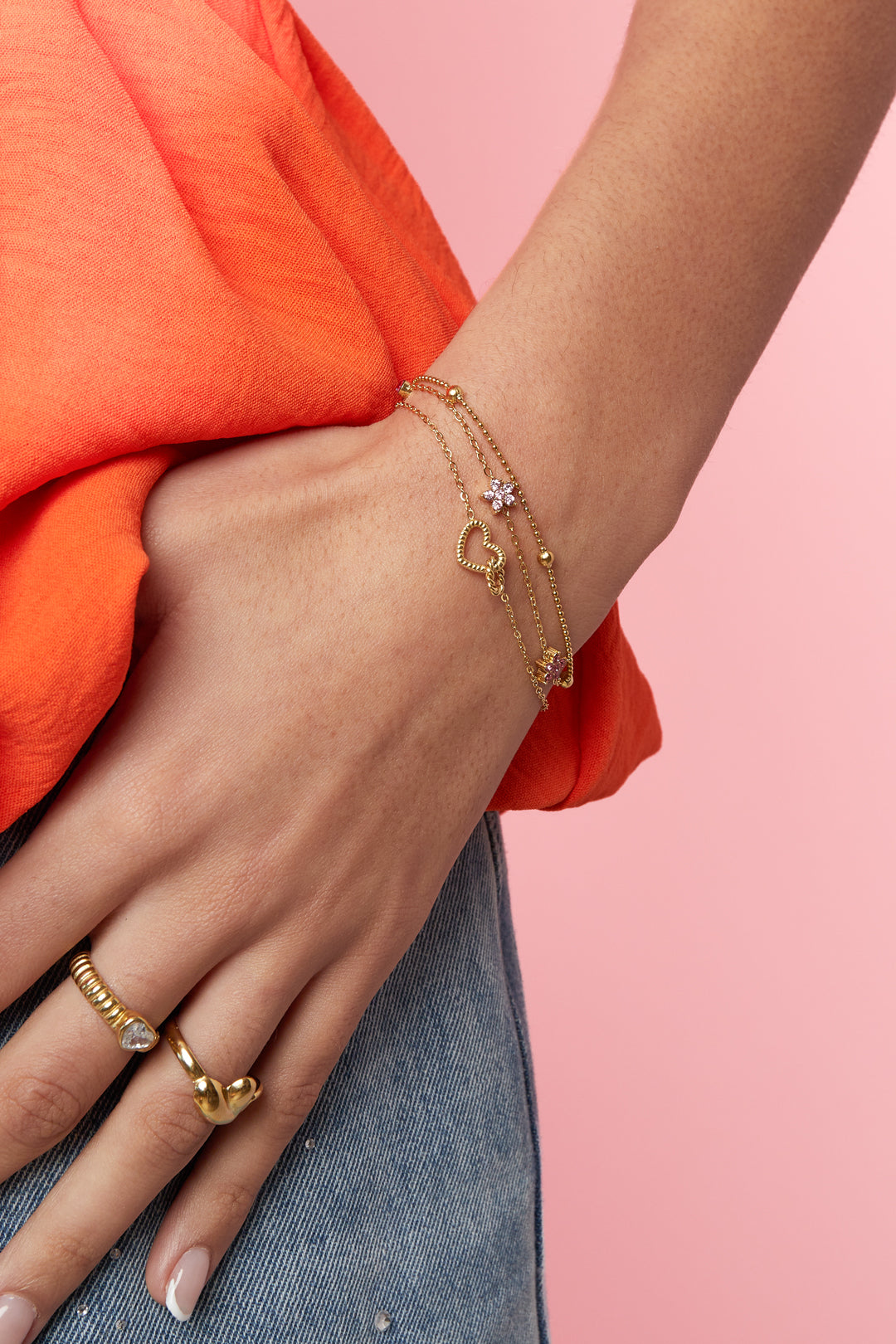 Stainless steel armband met hartje in goud