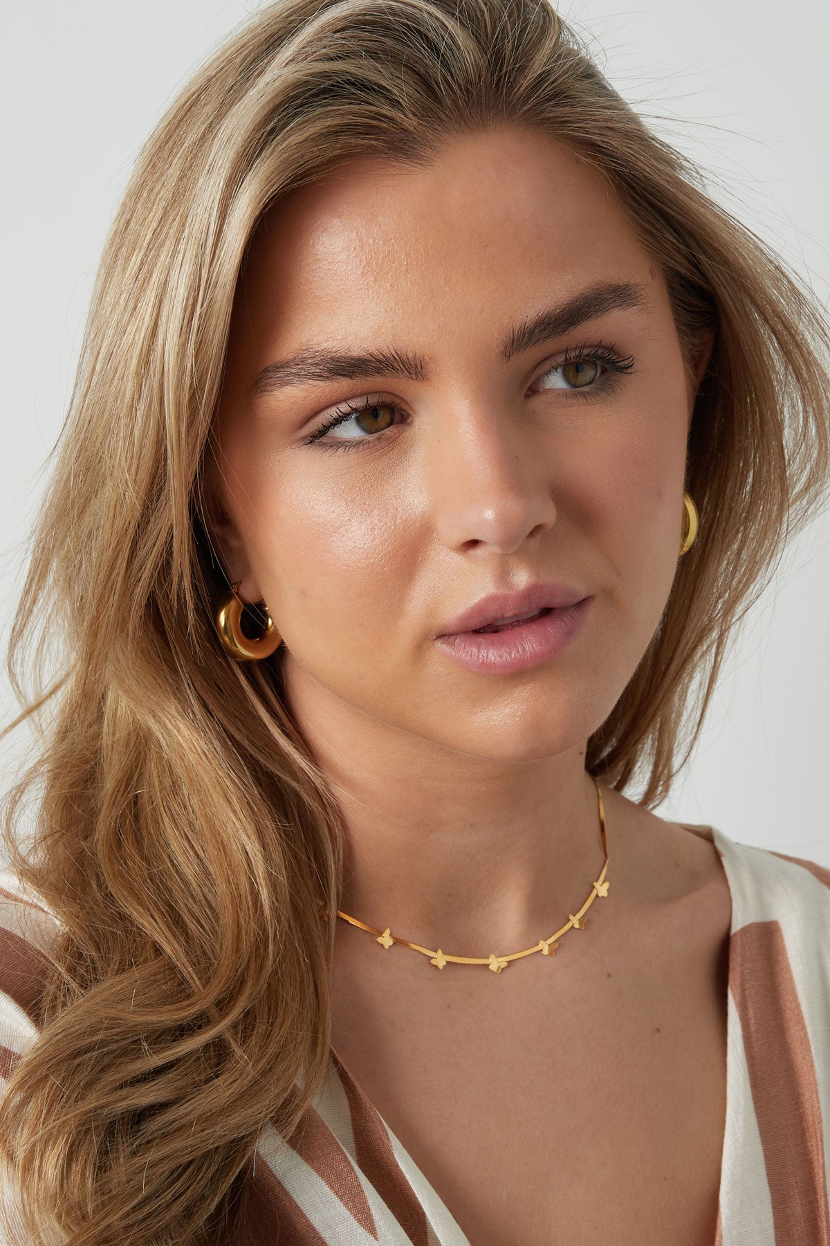 Minimalistische ketting met vlinders