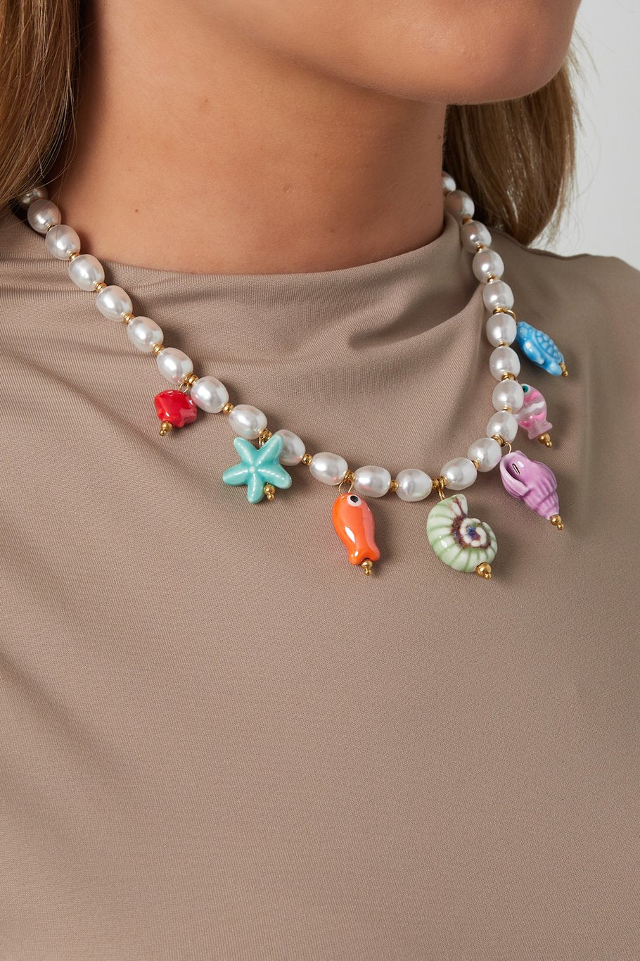 Parelketting met bedels