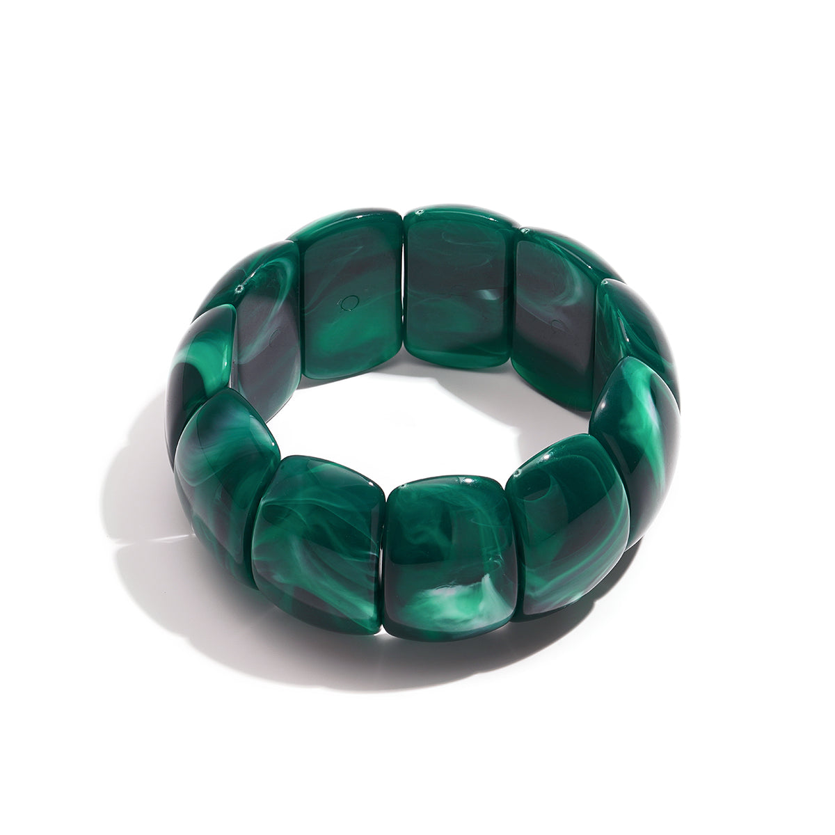 Statement armband met donkergroene gemarmerde schakels en hoogglans afwerking