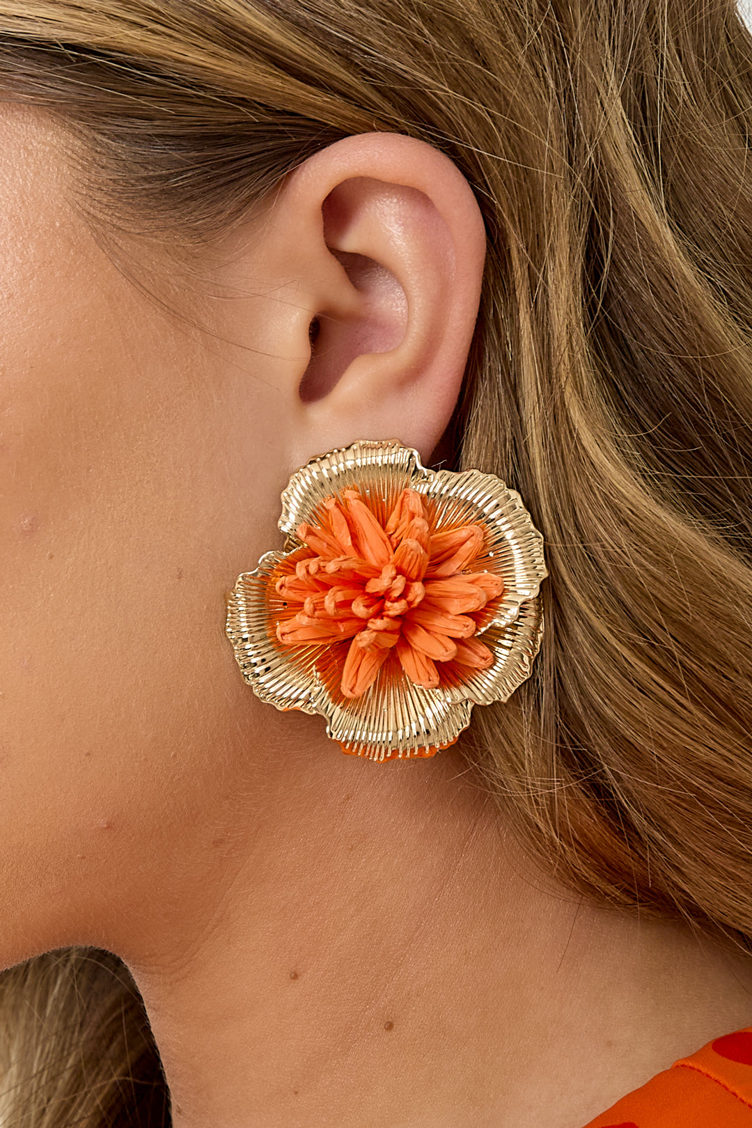 Statement oorbellen oranje bloem