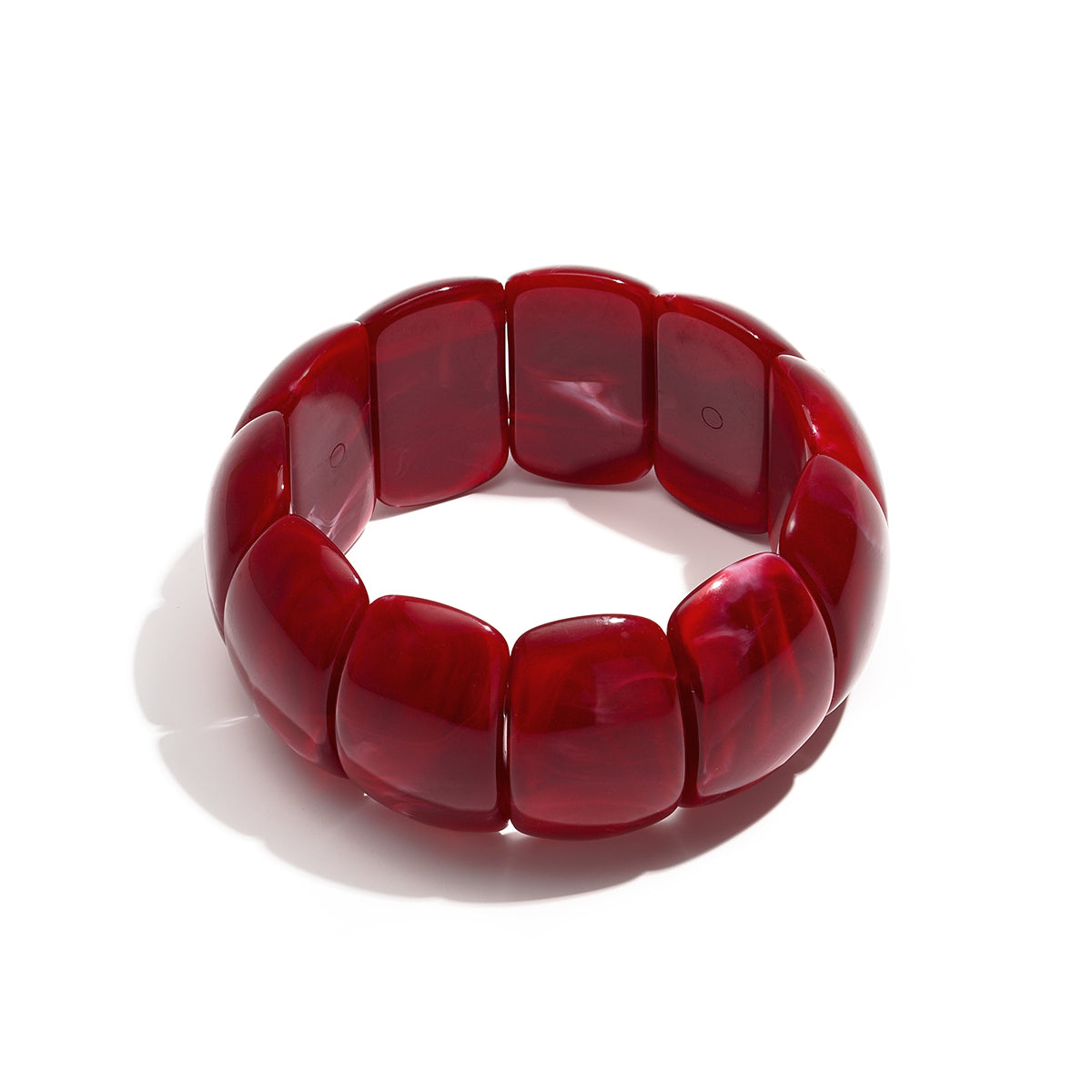 Statement armband met rode gemarmerde schakels en hoogglans afwerking