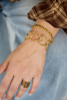 Bangle met open hartjes goudkleurig