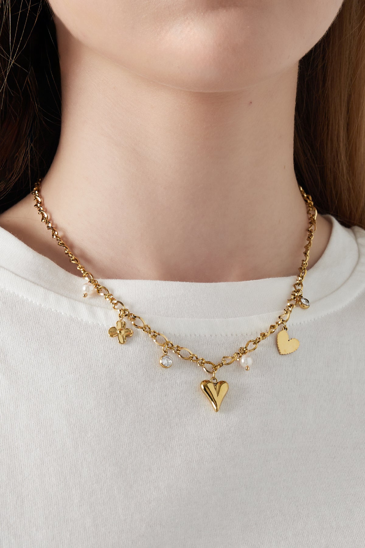 Ketting met bedels hartjes en bloemen