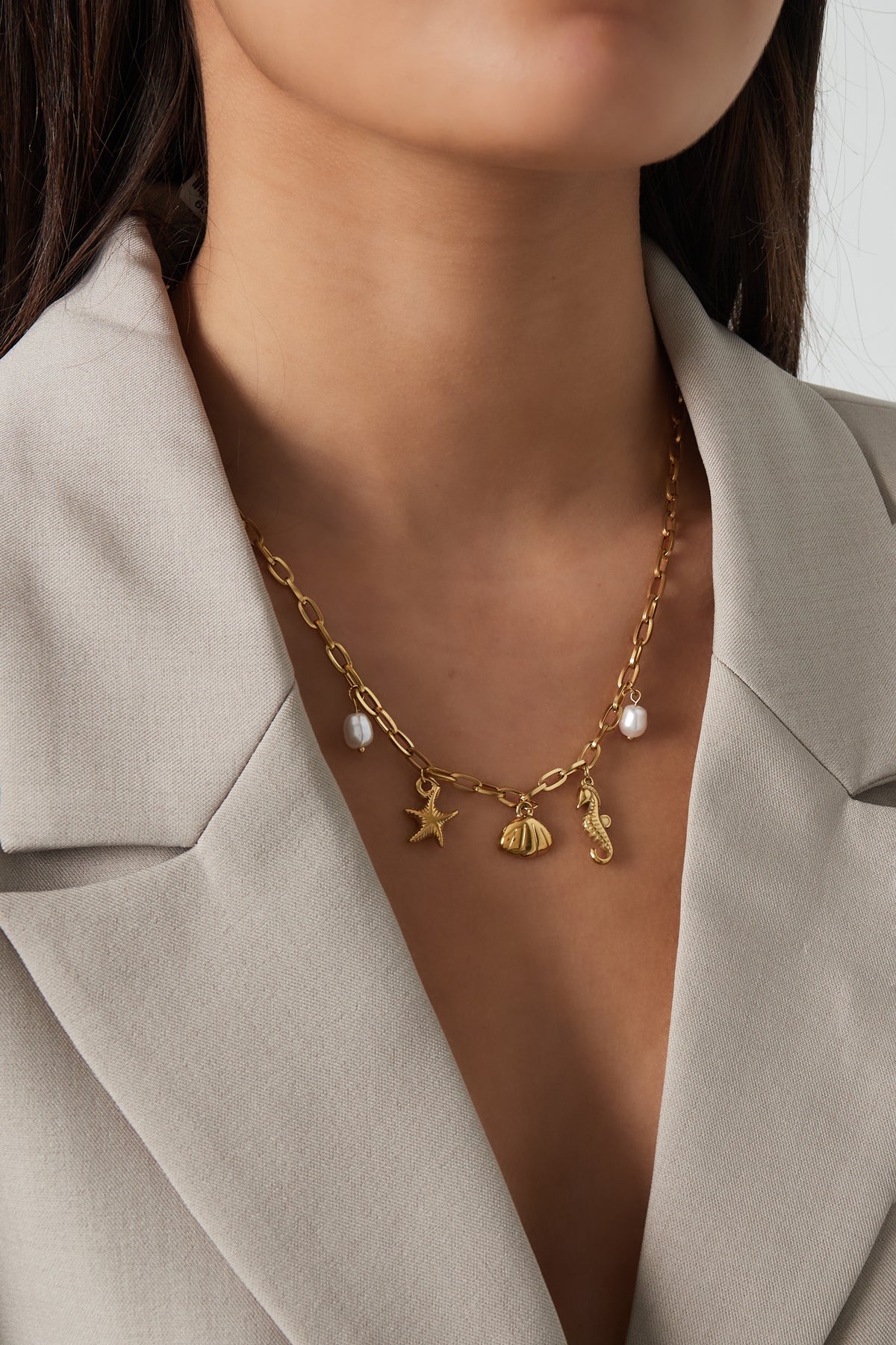 Ketting met bedels met zee bedels