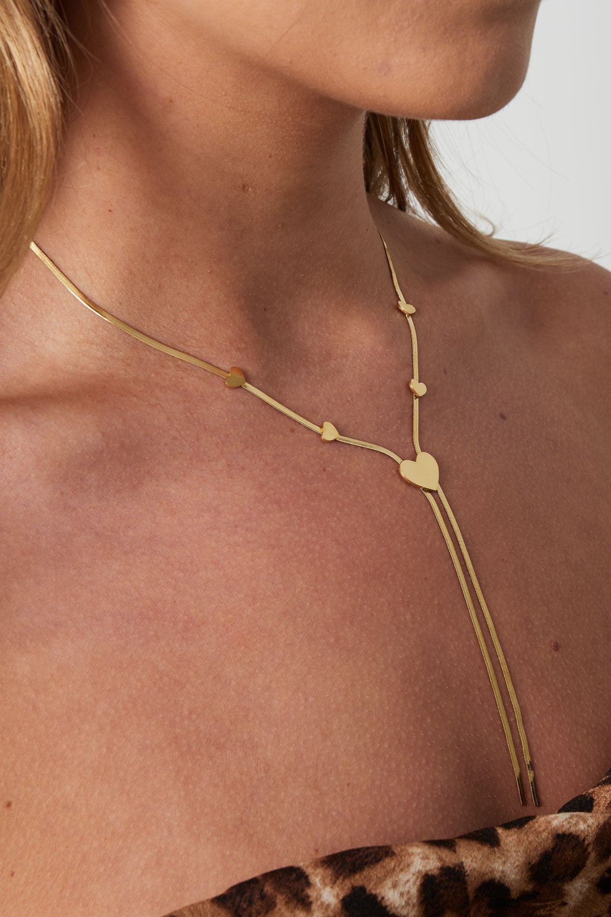 Lange ketting met hartjes goud