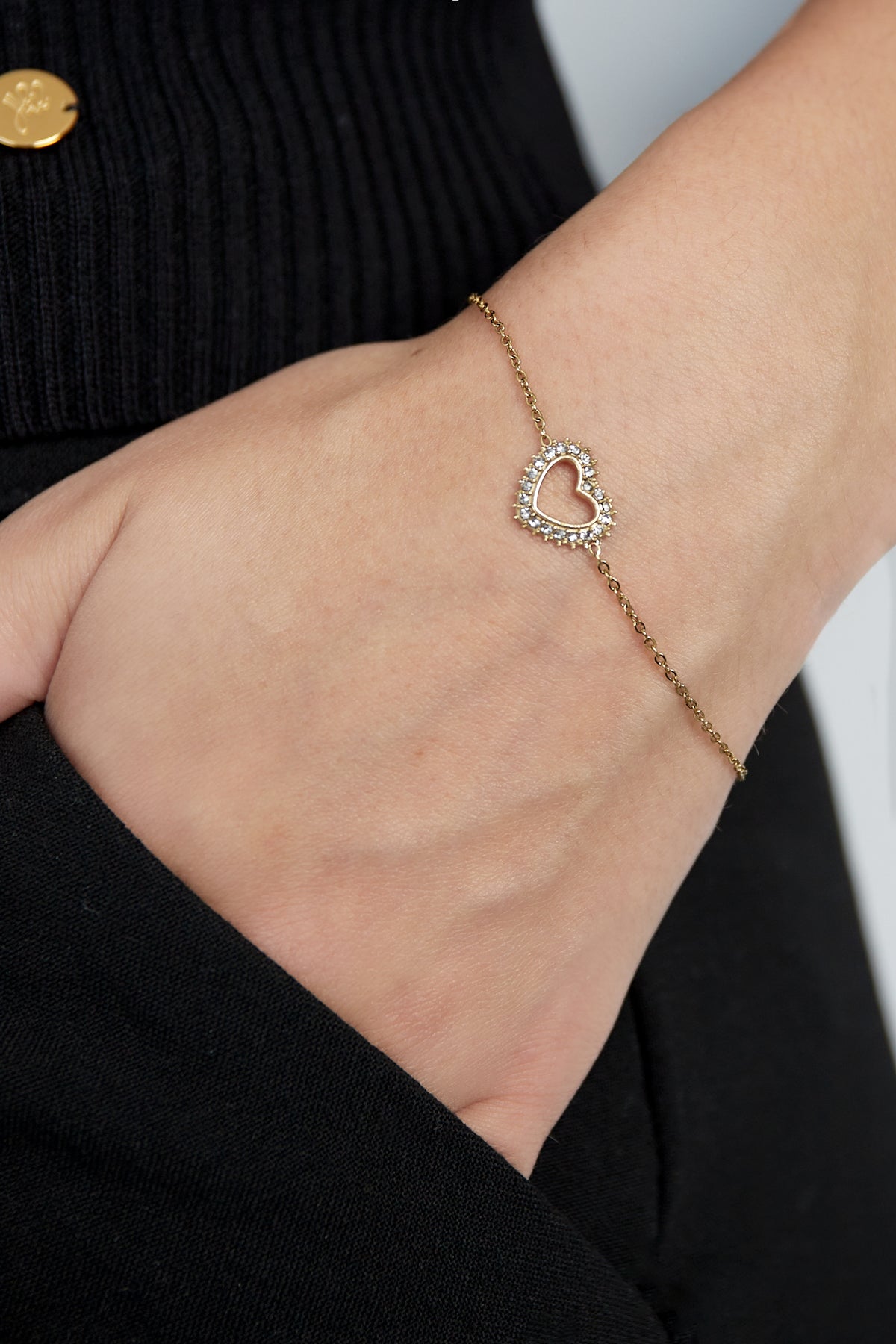 Minimalistische armband met open hartje en steentjes