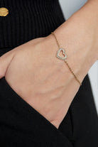 Minimalistische armband met open hartje en steentjes