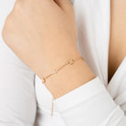 Minimalistische armband met verschillende figuurtjes
