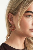 Statement oorbellen bloem