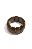 Statement armband met donkerbruine gemarmerde schakels en hoogglans afwerking